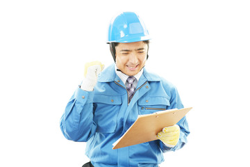 ガッツポーズの労働者