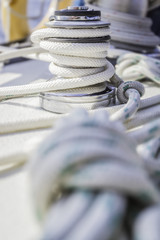 Fototapeta na wymiar winch with rope on sea yacht deck