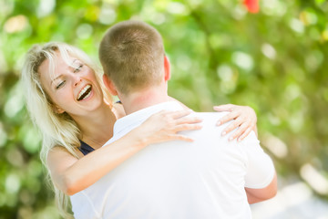 young loving couple on natural background