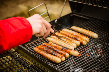 sausages at grill