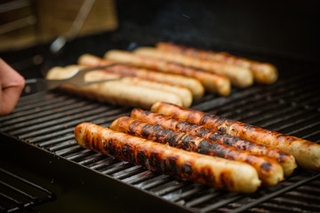 sausages at grill