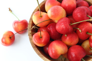Rainier cherries in a wooden bowl