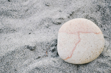 Fototapeta na wymiar Pink Pebble on Beach