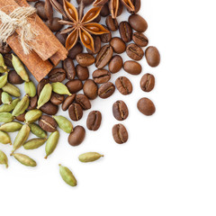 Coffee beans and spices on a white background