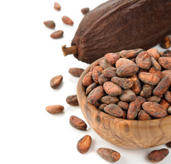 Cocoa beans in a wooden bowl
