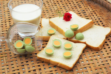 Obraz na płótnie Canvas fresh milk and bread plate with chocolate green.