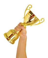 hand and golden trophy