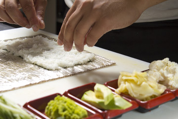 Making sushi roll
