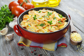 Vegetable baked with tomato and cheese