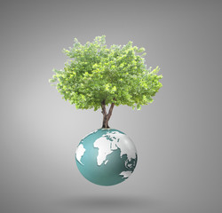 Small peaceful green planet ,tree on globe