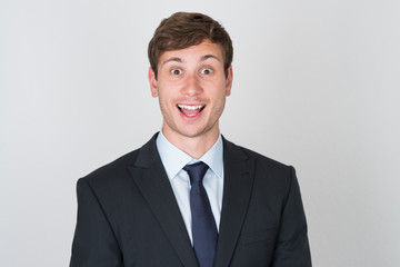 handsome man in suit excited