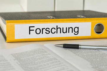 Aktenordner mit der Beschriftung Forschung