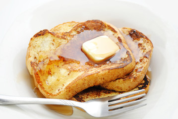 French Toast Served with Syrup and Butter