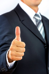 Businessman, gesturing with his finger, well done