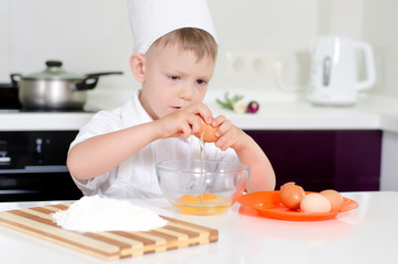 Young boy earning to be a chef