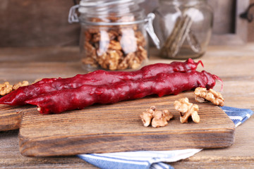 Tasty oriental sweets (churchkhela) and fresh nuts,