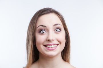 Fototapeta premium Young woman looking surprised. white background