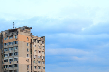 Old building on clouds background