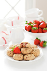 Oat bran, coconut and strawberry cookies, selective focus