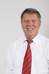 Portrait of young happy smiling business man, isolated over whit