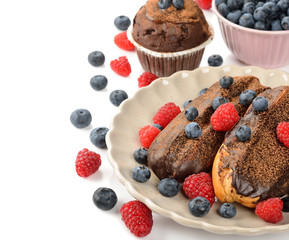 Eclairs with berries