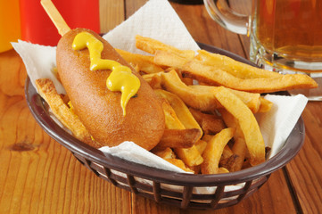 Corn dog with fries