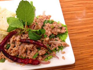 closed up spicy pork salad , thai food