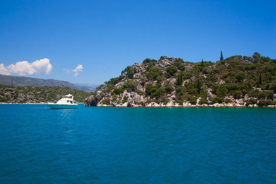 Bay in mediterranean sea with yacht in the Kekova