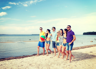 group of friends having fun on the beach