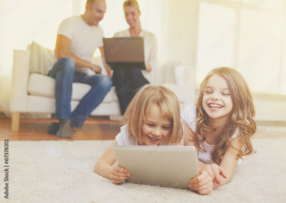 Canvas Prints smiling sister with tablet pc and parents on back