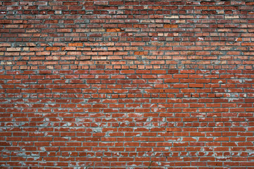 Red Cracked white grunge brick wall textured background stained