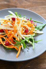 fresh arugula salad with carrots