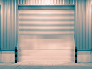 Roller door or roller shutter. Also called security door or security shutter with automatic system. For protection residential and commercial building i.e. house, warehouse, factory, shop and store.