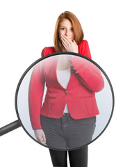 Woman's body magnified with magnifying glass
