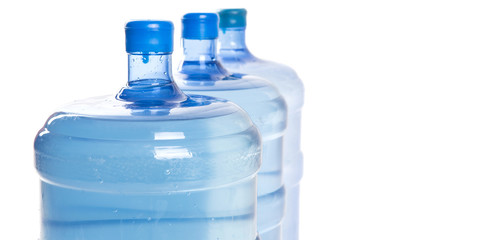 Large mineral water container over white background 