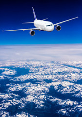 aeroplane.  Airplane over the mountains