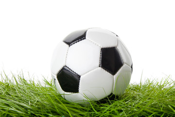 Fototapeta na wymiar soccer ball on the green field. ball on the grass