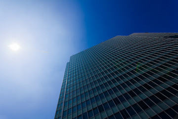 Skyscrapers view with blue sky .  office buildings. modern glass