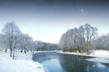 winter river at night. Elements of this image furnished by NASA