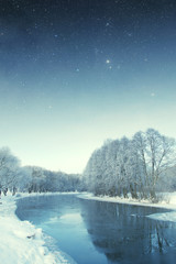 winter river at night. Elements of this image furnished by NASA