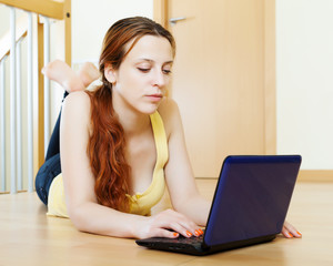 Fototapeta na wymiar Young woman with netbook