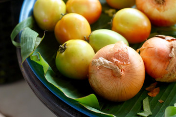 Onions and tomatoes at the market