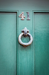 Door number 41 with door knocker for use as a background