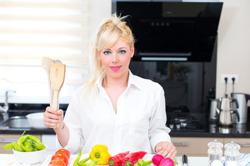 Pretty Woman in the kitchen