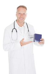 Doctor Holding Medicine Box