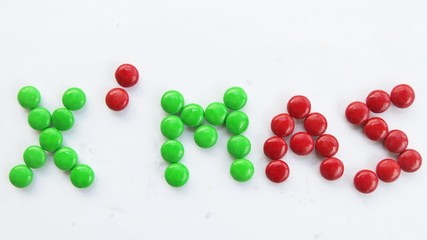 the word X'Mas made by chocolate mm candy