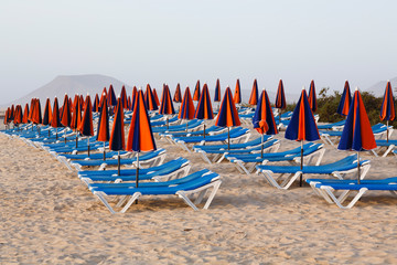 Sun loungers on beach