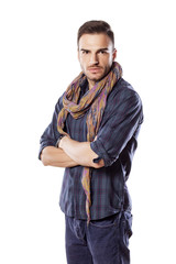 handsome young man with a scarf and crossed arms