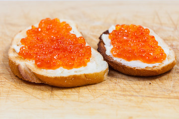 Sandwiches with salmon red caviar 