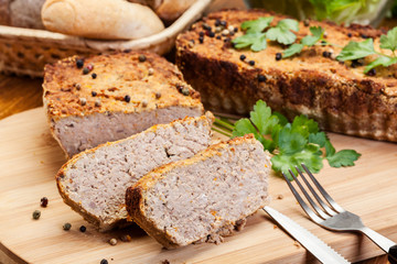 Fototapeta na wymiar Traditional delicious meat pate with vegetables